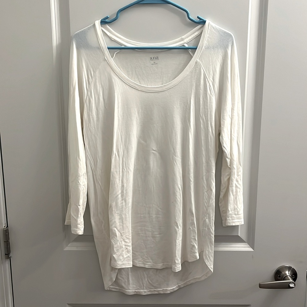 A.N.A white shirt.
3/4 sleeveses